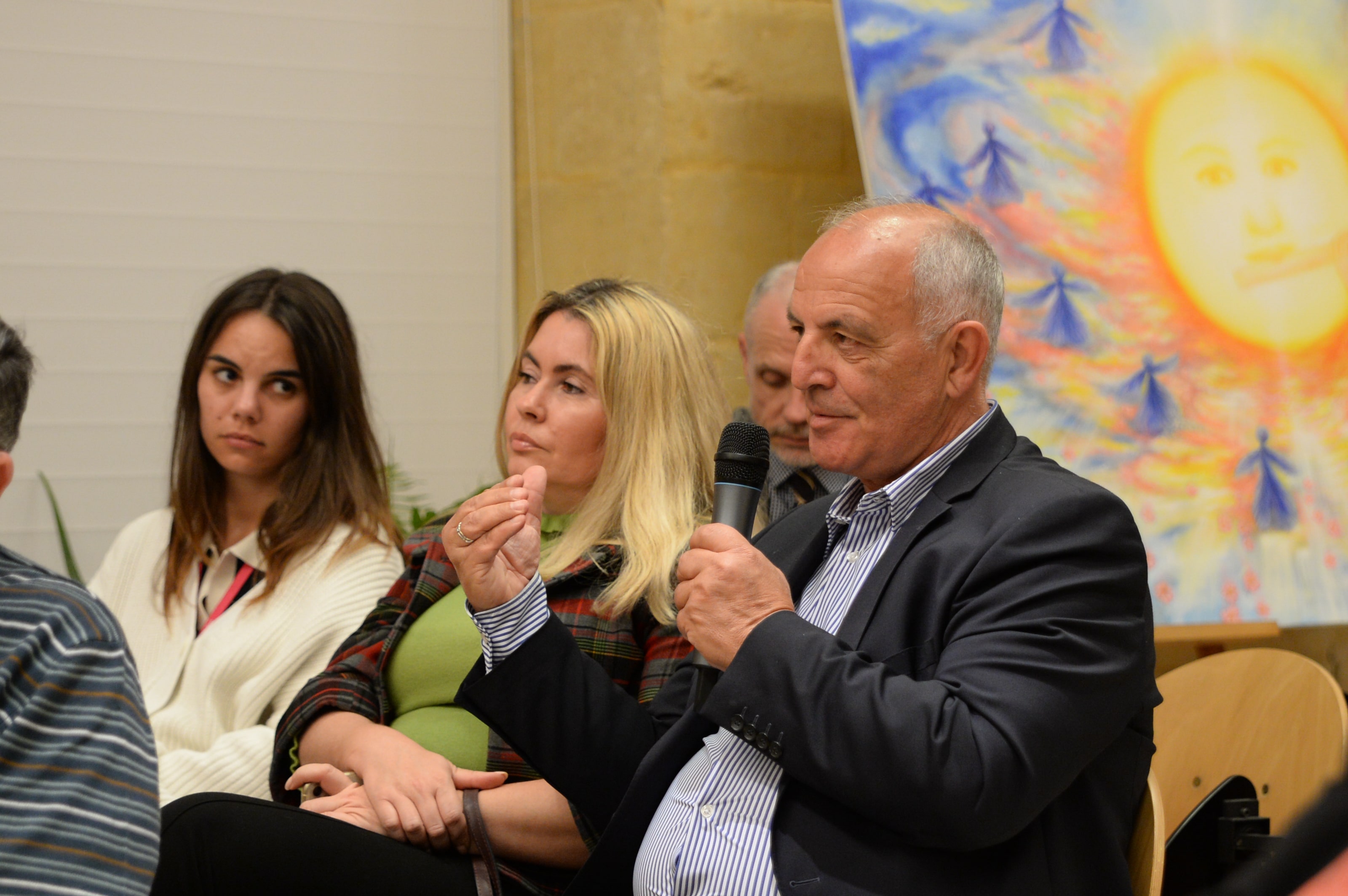 The audience asking questions at the "Internal Worlds, External Relations" event