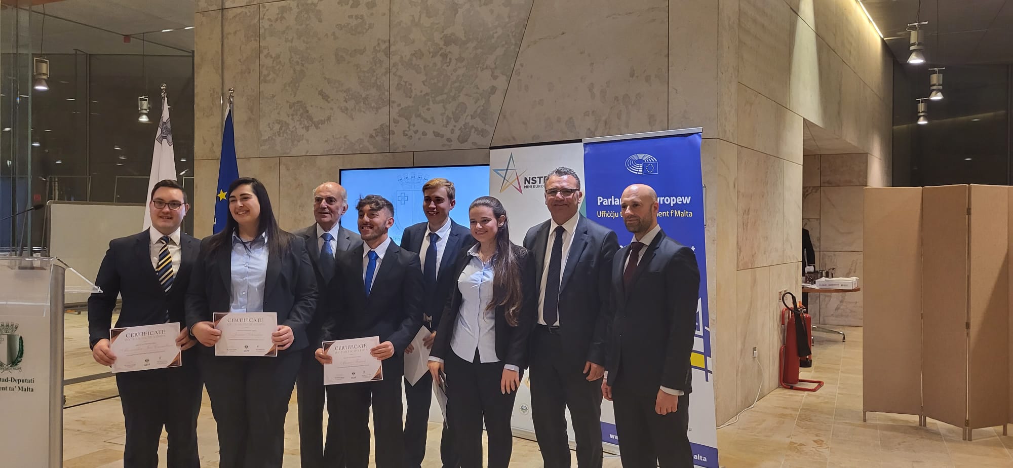 2023 International Mini-European Assembly participants receiving certificates
