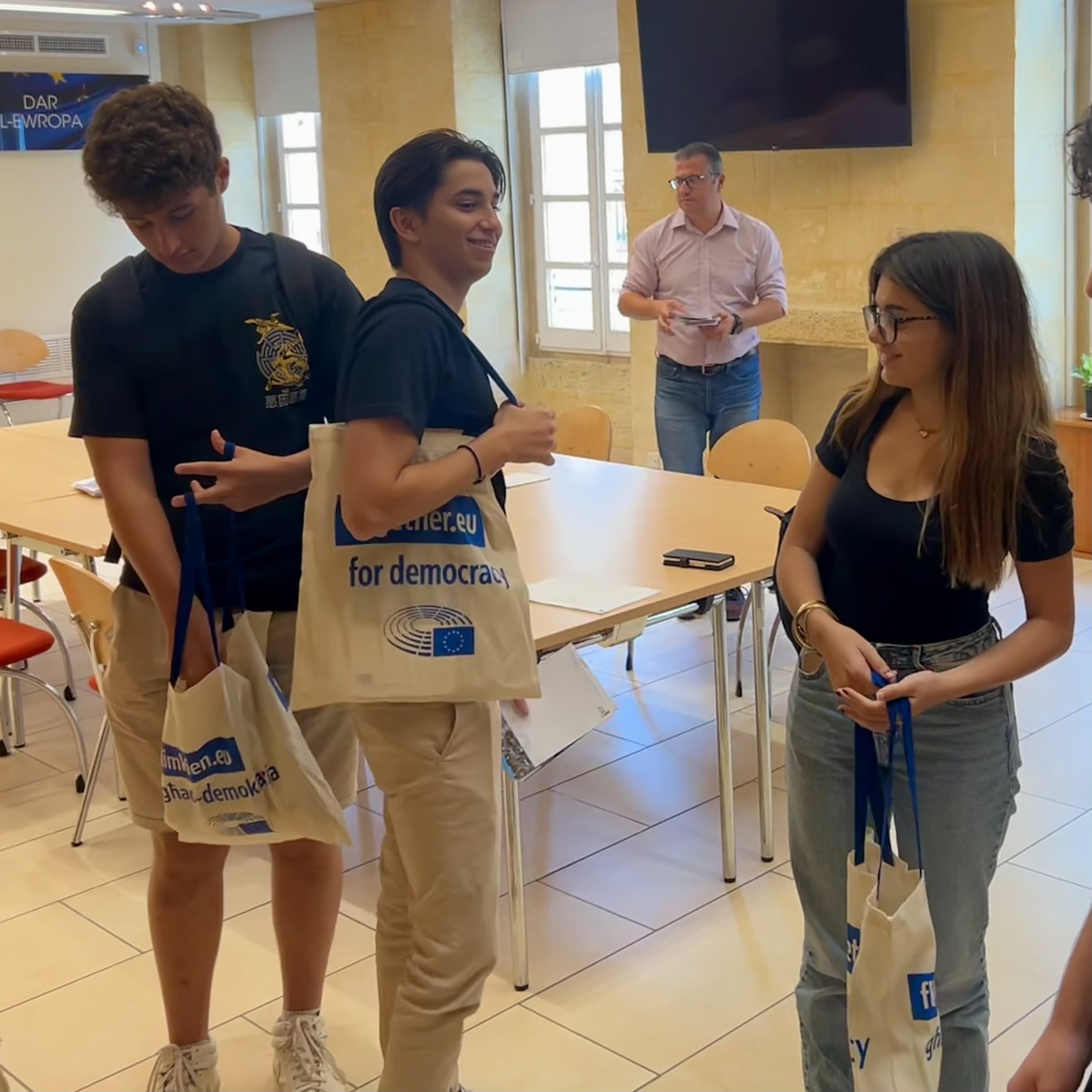 Students getting their together.eu freebies at Europe House in Valletta